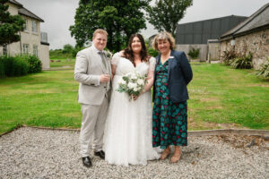 Bride and groom with their celebrant