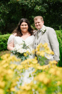 Bride and groom smiling following the ceremony