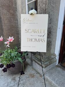 Notice at the entrance to Scorrier House giving the name of the bride and groom